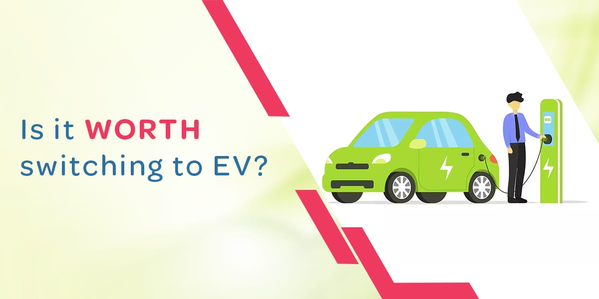 Man charging car at charging station